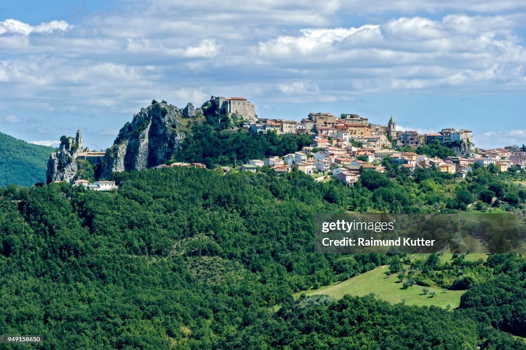 View of mountain village Bagnoli del Trigno with church Chiesa di San Silvestro and castle ruin Chiesa di San Silvestro, Bagnoli del Trigno, Molise, Italy