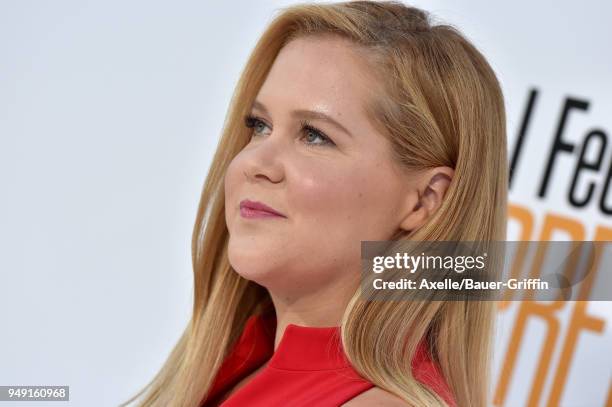 Actress Amy Schumer arrives at the premiere of STX Films' 'I Feel Pretty' at Westwood Village Theatre on April 17, 2018 in Westwood, California.