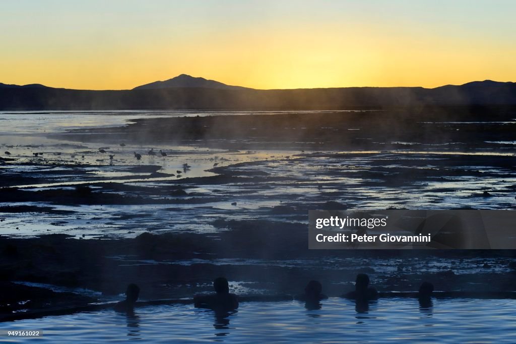 Bathers in the hot spring Termas de Polques at the Salar de Chalviri, Reserva Nacional de Fauna Andina Eduardo Abaroa, Sur Lipez, Potosi, Bolivia