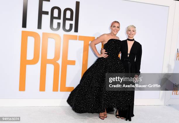 Actors Busy Philipps and Michelle Williams arrive at the premiere of STX Films' 'I Feel Pretty' at Westwood Village Theatre on April 17, 2018 in...