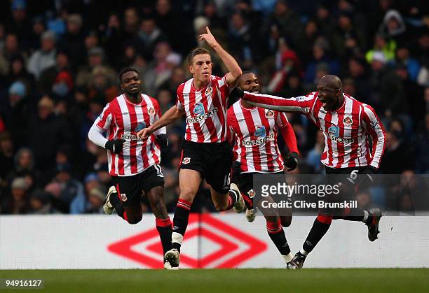 Jordan Henderson of Sunderland celebrates after scoring his teams second goal during the Barclays Premier League match between Manchester City and...