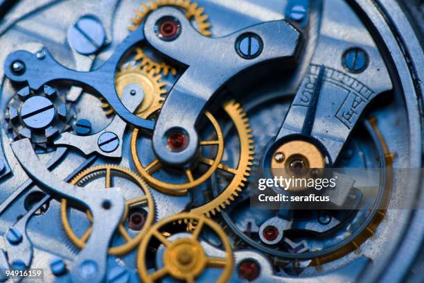im die uhr - uhrwerk stock-fotos und bilder