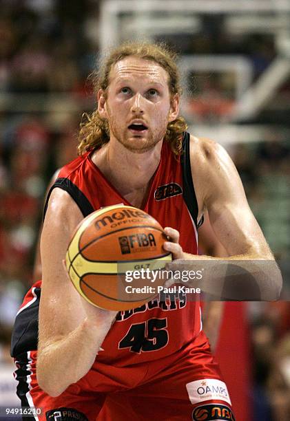 Luke Schenscher of the Wildcats shoots a free throw during the round 13 NBL match between the Perth Wildcats and the Adelaide 36ers at Challenge...