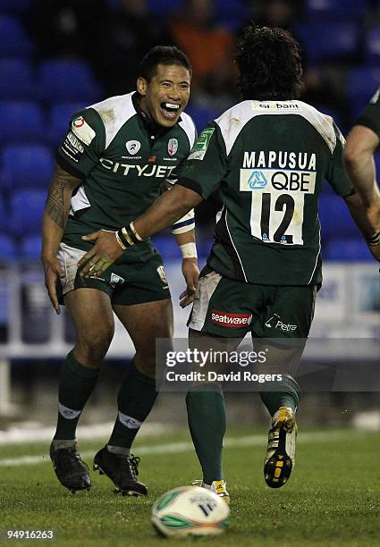 PREADING, ENGLAND Elvis Seveali'i of London Irish celebrates after scoring a try with teammate Seilala Mapusua during the Heineken Cup match between...