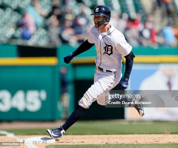 JaCoby Jones of the Detroit Tigers celebrates while rounding third base after hitting a walk-off home run in the 10th inning to defeat the Kansas...