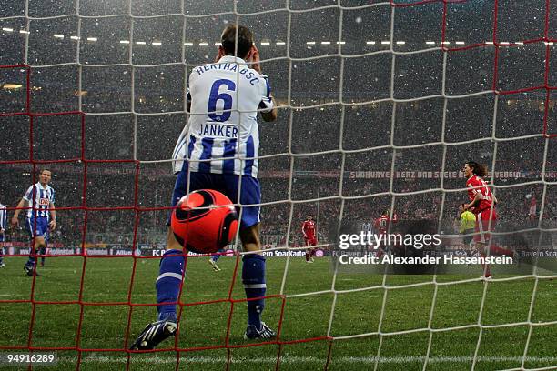 Christoph Janker of Berlin reacts after receiving the 4th goal during the Bundesliga match between Bayern Muenchen and Hertha BSC Berlin at the...