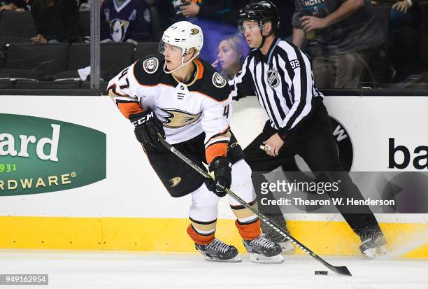 Hampus Lindholm of the Anaheim Ducks skates up ice with control of the puck against the San Jose Sharks during the second period in Game Four of the...