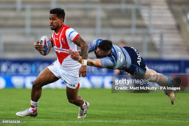 Huddersfield Giants' Sam Wood tackles St Helens' Ben Barba during the Betfred Super League match at the Totally Wicked Stadium, St Helens.