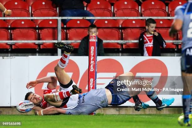 St Helens' Ryan Morgan scores a try during the Betfred Super League match at the Totally Wicked Stadium, St Helens.
