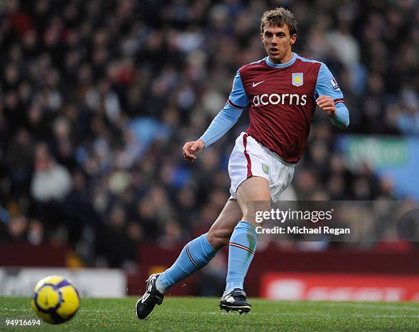 Stephen Warnock of Aston Villa plays the ball during the Barclays Premier League match between Aston Villa and Stoke City at Villa Park on December...