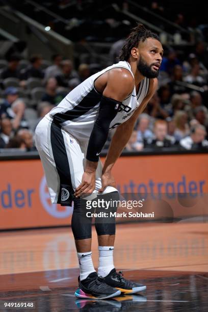 Patty Mills of the San Antonio Spurs looks on during Game Three of the Western Conference Quarterfinals against the Golden State Warriors in the 2018...