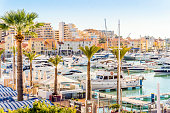 Marina full of luxurious yachts in touristic Vilamoura, Algarve, Portugal