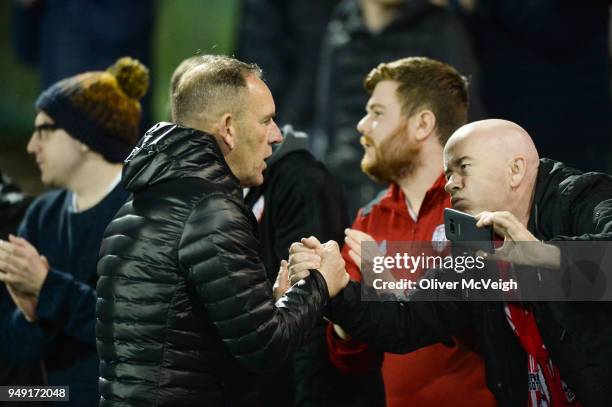 Dundalk , Ireland - 20 March 2018; Derry City manager Kenny Shiels celebrates with fans after the SSE Airtricity League Premier Division match...