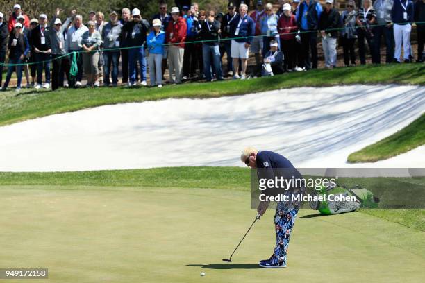 John Daly strokes a putt for birdie on the eighth green during the second round of the PGA TOUR Champions Bass Pro Shops Legends of Golf at Big Cedar...