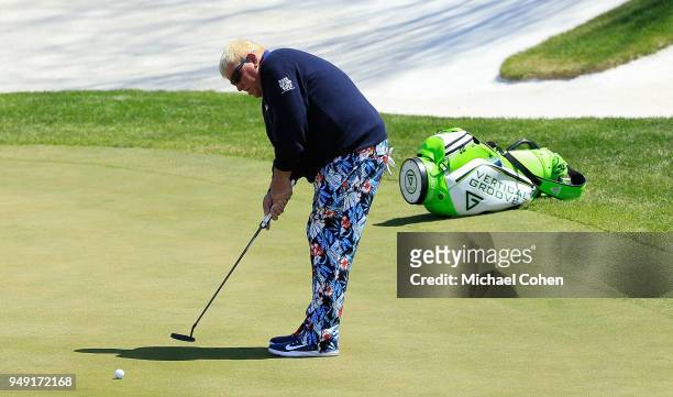 John Daly strokes a putt for birdie on the eighth green during the second round of the PGA TOUR Champions Bass Pro Shops Legends of Golf at Big Cedar...