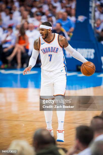Carmelo Anthony of the Oklahoma City Thunder handles the ball against the Utah Jazz in Game Two of Round One of the 2018 NBA Playoffs on April 18...