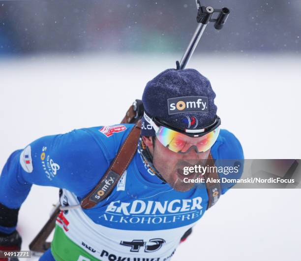 Simon Fourcade of France competes during the Men's 10km Sprint in the e.on Ruhrgas IBU Biathlon World Cup on December 19, 2009 in Pokljuka, Slovenia.