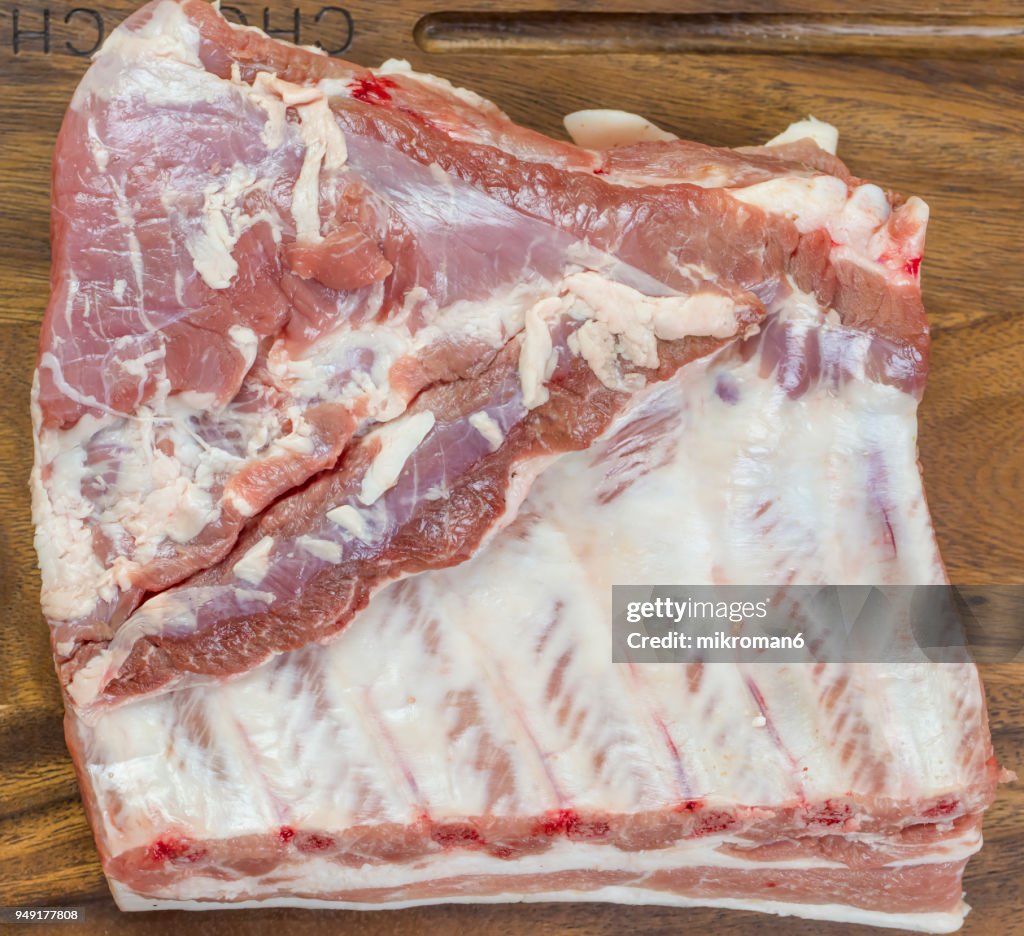 Fresh and raw meat. Uncooked ribs and pork chops, Raw spare ribs ready to grill and barbecue