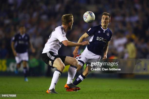 Jed Wallace of Millwall battles for the ball with Tim Ream of Fulham during the Sky Bet Championship match between Millwall and Fulham at The Den on...