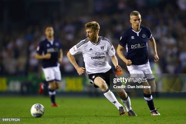 Tim Ream of Fulham runs with the ball during the Sky Bet Championship match between Millwall and Fulham at The Den on April 20, 2018 in London,...