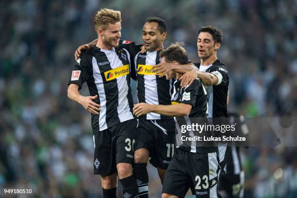 Nico Elvedi , Raffael, Jonas Hofmann and Lars Stindl of Moenchengladbach celebrate a goal during the Bundesliga match between Borussia...