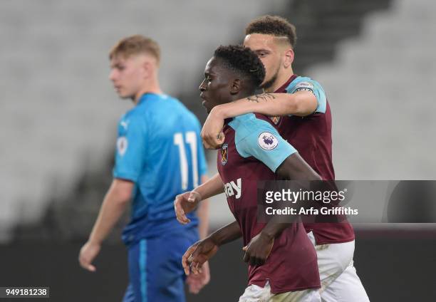 Domingos Quina of West Ham United celebrates his goal with Marcus Browne during the Premier League 2 match between West Ham United and Arsenal at...