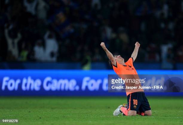 Winning goalscorer Lionel Messi of FC Barcelona celebrates at the end of the FIFA Club World Cup Final match between Estudiantes LP and FC Barcelona...