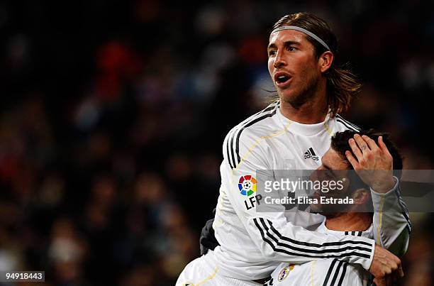 Gonzalo Higuain of Real Madrid cebrates with Sergio Ramos after scoring during the La Liga match between Real Madrid and Real Zaragoza at Estadio...