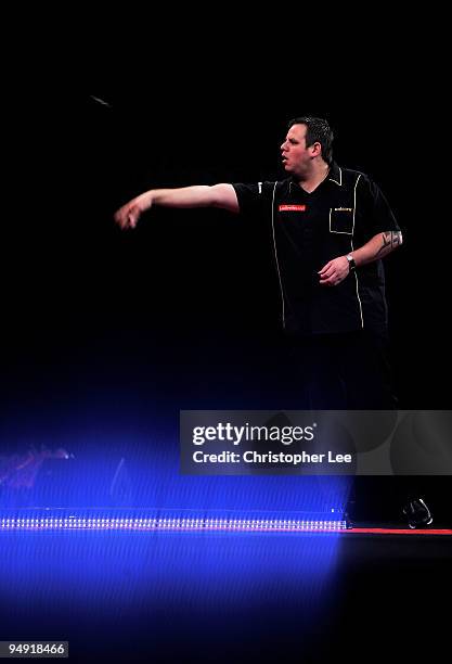 Adrian Lewis of England in action against Aodhagan O'Neill of Republic of Ireland during the 2010 Ladbrokes.com World Darts Championship Round One at...