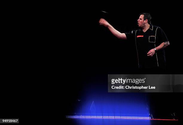 Adrian Lewis of England in action against Aodhagan O'Neill of Republic of Ireland during the 2010 Ladbrokes.com World Darts Championship Round One at...