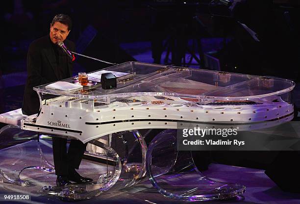 Udo Juergens performs during the 100th anniversary gala show at the Westfallenhalle on December 19, 2009 in Dortmund, Germany.