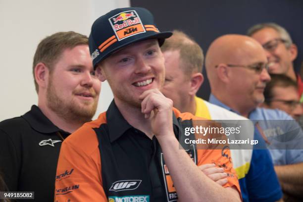 Bradley Smith of Great Britain and Red Bull KTM Factory Racing smiles during the MotoGP Legend Ceremony in order to celebrate Randy Mamola of USA in...