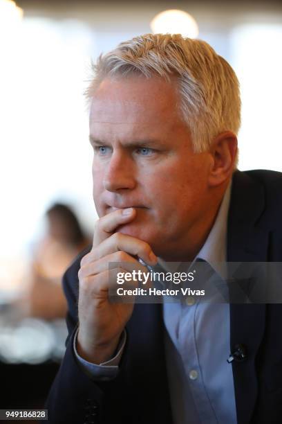 Photographer John Moore listens during the launch event of Undocumented book at WeWork Varsovia Building on April 19, 2018 in Mexico City, Mexico.