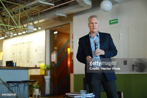 Photographer John Moore speaks during the launch event of Undocumented book at WeWork Varsovia Building on April 19, 2018 in Mexico City, Mexico.