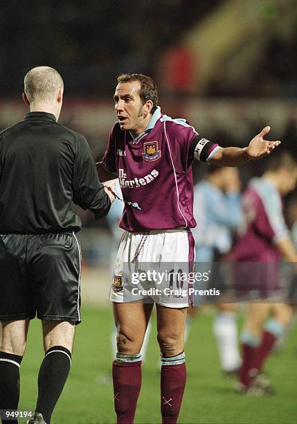 Paolo Di Canio of West Ham protests his innocence to referee Dermot Gallagher during the FA Carling Premiership match against Coventry City played at...