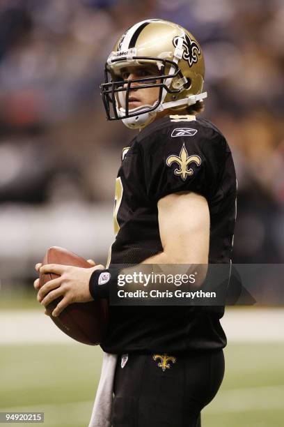 Quarterback Drew Brees of the New Orleans Saints looks on during pre-game warmups before taking on the Dallas Cowboys at Louisiana Superdome on...