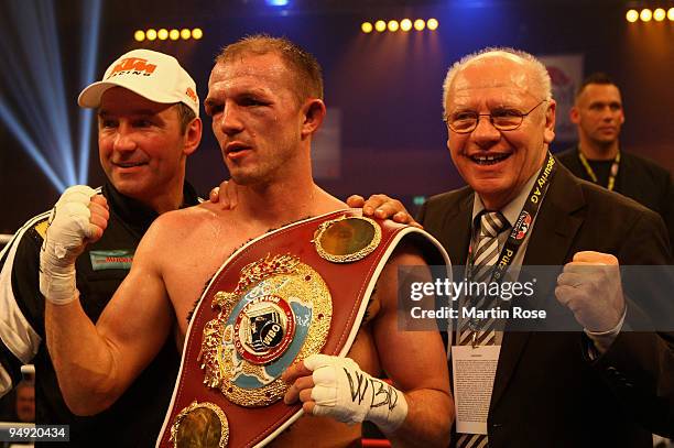 Juergen Braehmer of Germany poses with the trophy after the WBO light heavyweight world championship fight during the Universum Champions night...
