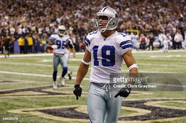 Miles Austin of the Dallas Cowboys reacts after his 49-yard touchdown in the first quarter against the New Orleans Saints at the Louisiana Superdome...