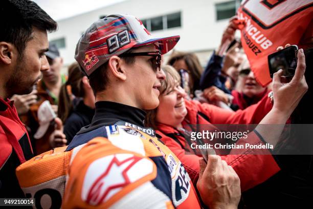 Marc Marquez of Spain signs autographs after the MotoGP Red Bull U.S. Grand Prix of The Americas - Free Practice 2 at Circuit of The Americas on...