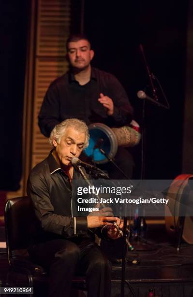 Turkish musician and composer Omar Faruk Tekbilek performs on the end-blown wooden Turkish flute known as the 'ney' with his Ensemble with his son...