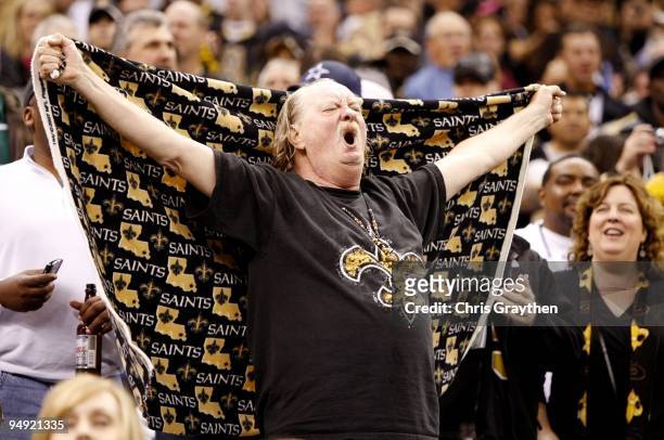 Bill Harris, 'the Unknown Who Dat', a fan of the New Orleans Saints cheers on the Saints against the Dallas Cowboys at Louisiana Superdome on...