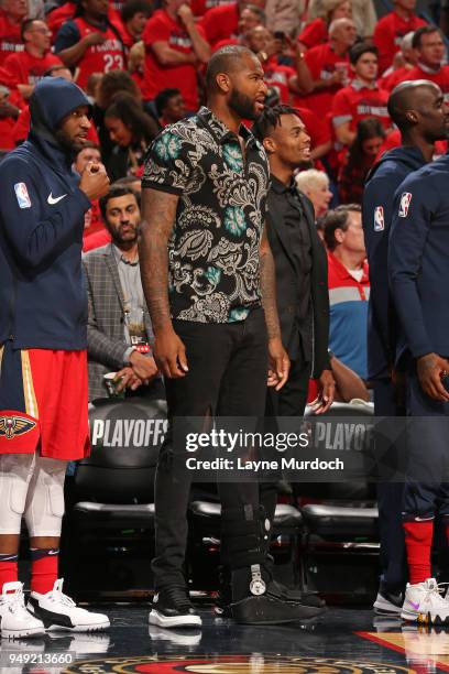 DeMarcus Cousins of the New Orleans Pelicans looks on during the game against the Portland Trail Blazers in Game Three of Round One of the 2018 NBA...