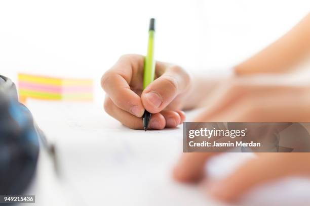 teenage boy studying at home - teenagers only imagens e fotografias de stock