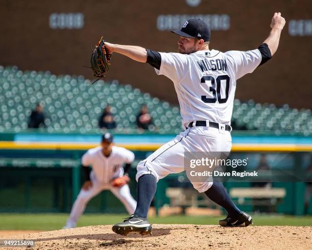 Alex Wilson of the Detroit Tigers pitches in the seventh inning against the Baltimore Orioles during a MLB game at Comerica Park on April 18, 2018 in...