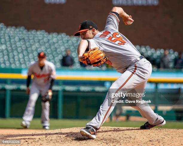 Darren O'Day of the Baltimore Orioles pitches in the eighth inning during a MLB game at Comerica Park on April 18, 2018 in Detroit, Michigan. The...