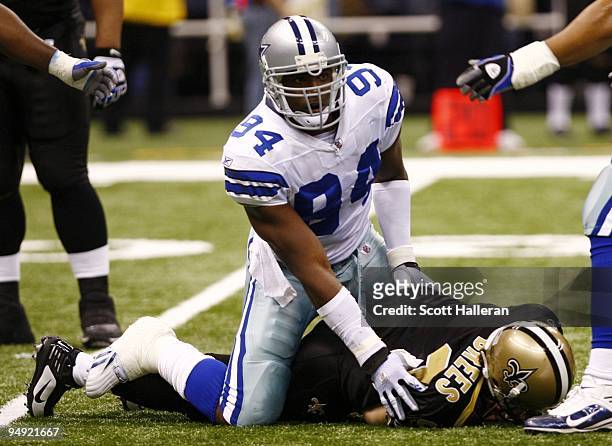 Linebacker DeMarcus Ware of the Dallas Cowboys sacks quarterback Drew Brees of the New Orleans Saints at the Louisiana Superdome on December 19, 2009...