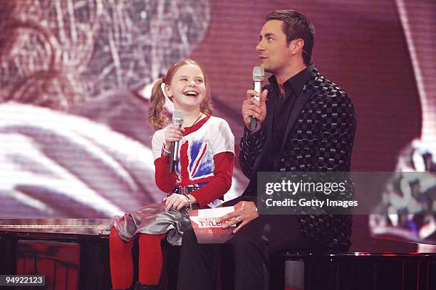 Carlotta Truman, Marco Schreyl , performs during the finals of the TV show 'Das Supertalent' on December 19, 2009 in Cologne, Germany.