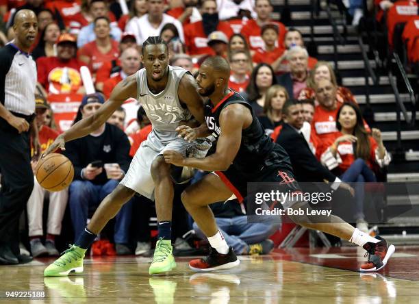 Andrew Wiggins of the Minnesota Timberwolves looks to drive on Chris Paul of the Houston Rockets during Game Two of the first round of the Western...