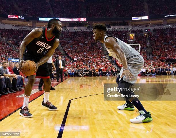 James Harden of the Houston Rockets looks for room to shoot on Jimmy Butler of the Minnesota Timberwolves during Game Two of the first round of the...
