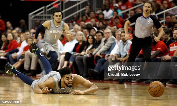 Karl-Anthony Towns of the Minnesota Timberwolves comes up short ash dives for a loose ball against the Houston Rockets during Game Two of the first...